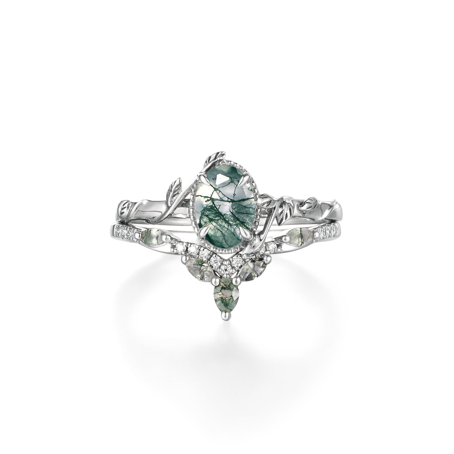 Moss agate engagement ring set with leaf motifs and moissanite accents.