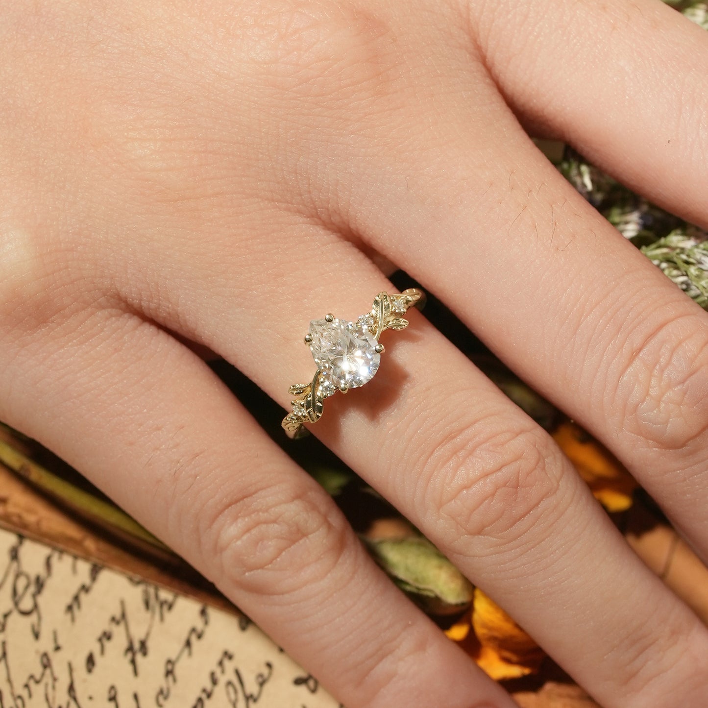 Pear-shaped Moissanite Engagement Ring
