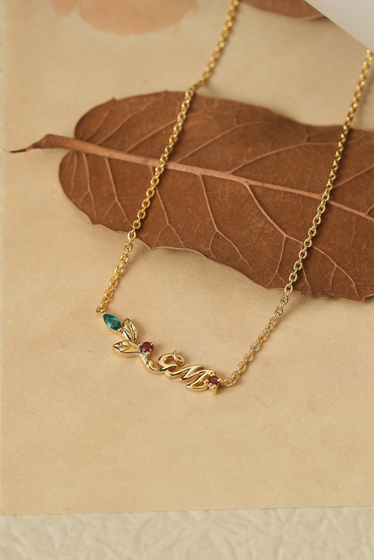 GemsMagic Signature: Christmas Garnet and Emerald Necklace - GemsMagic