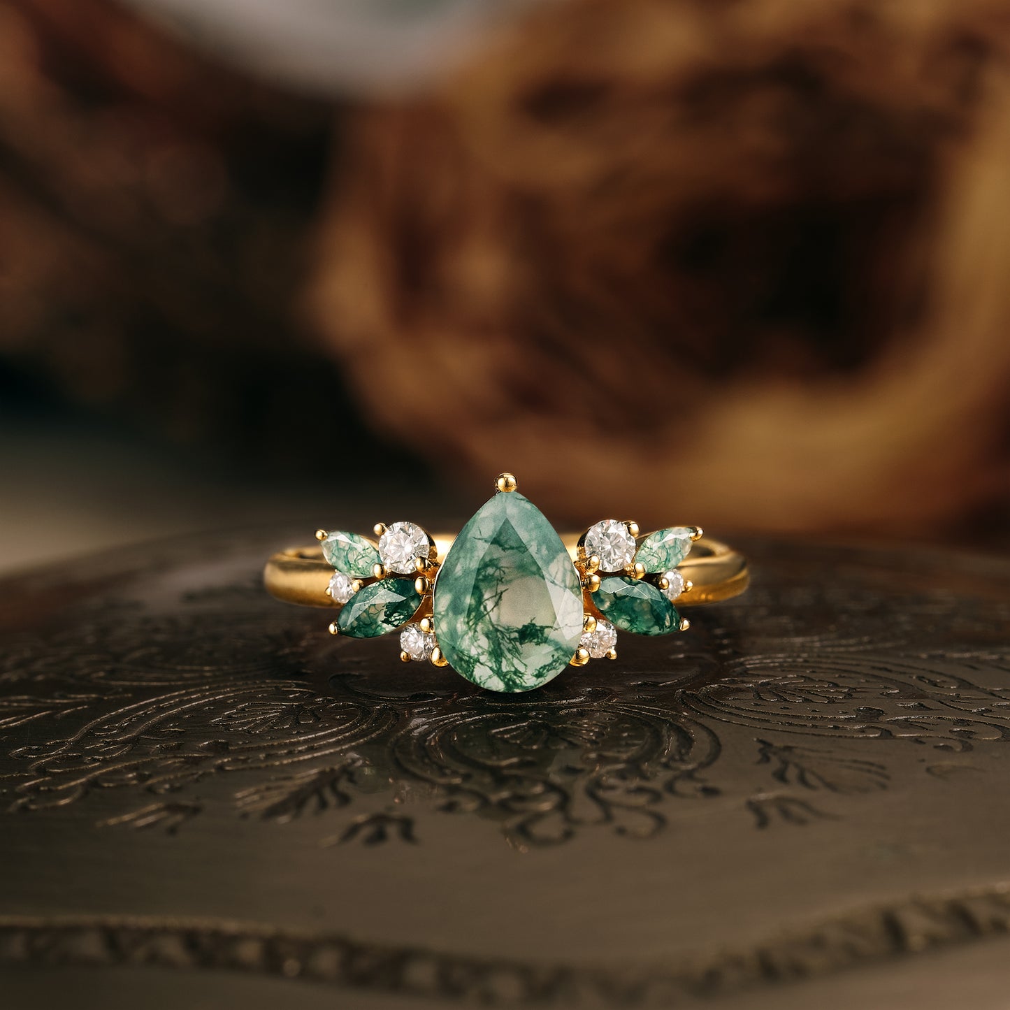 Moss agate engagement ring with moissanite accents in gold band