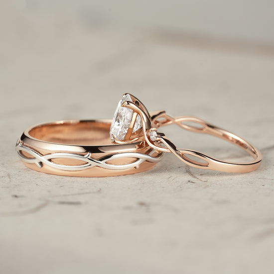 Moissanite couple's ring set showcasing vine design in rose and white gold.