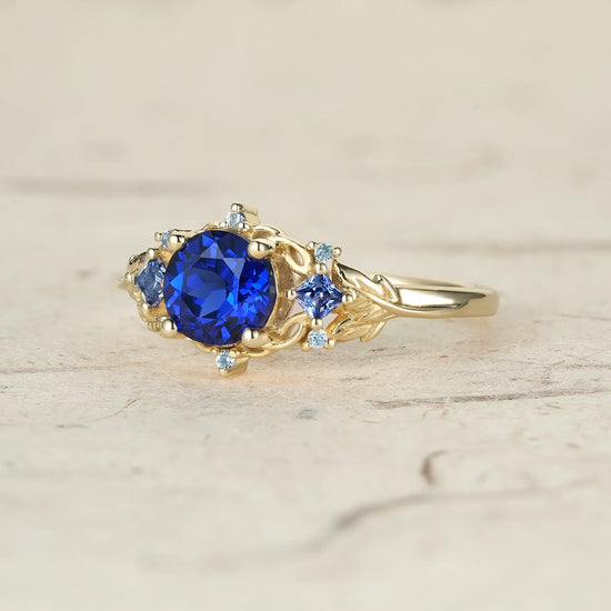 Three Stone Royal Blue Sapphire Engagement Ring