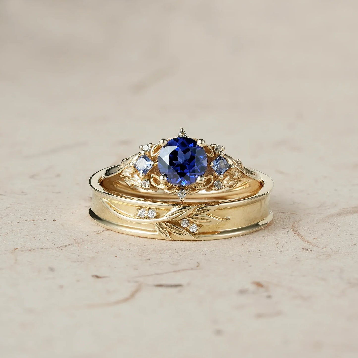 Three-Stone Royal Blue Sapphire Leaf Couple Rings