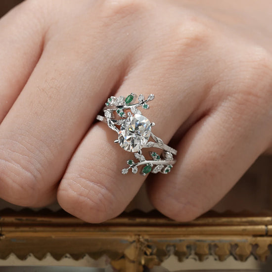 Oval Moissanite and Emerald Leaf Engagement Ring Set