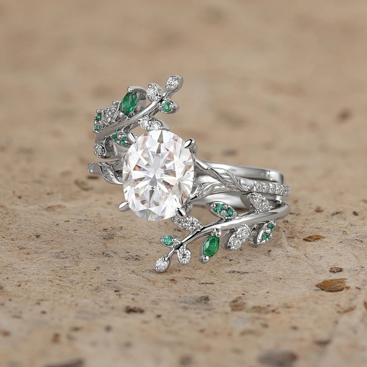Oval Moissanite and Emerald Leaf Engagement Ring Set