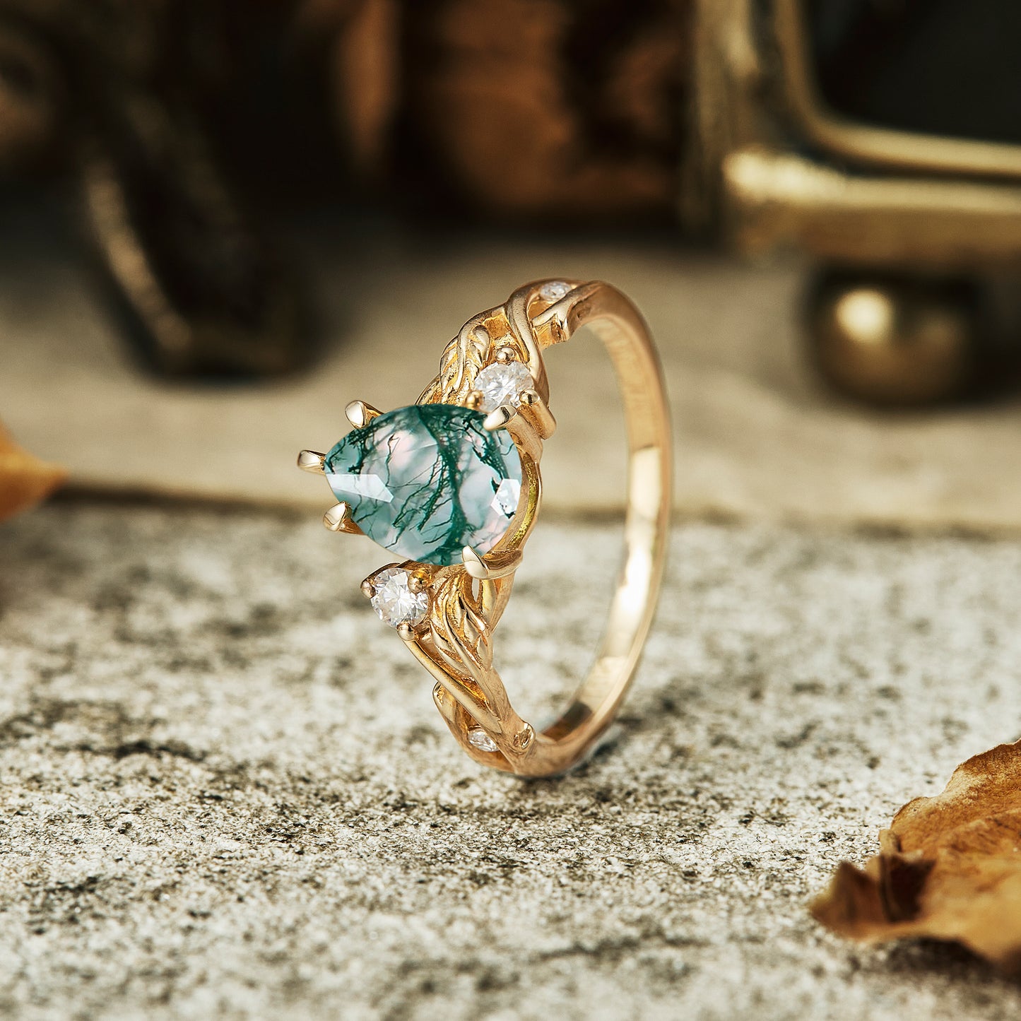 Moss agate engagement ring with vine design and moissanite accents in gold