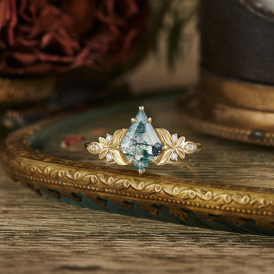 Kite cut moss agate engagement ring with leaf motifs in gold setting