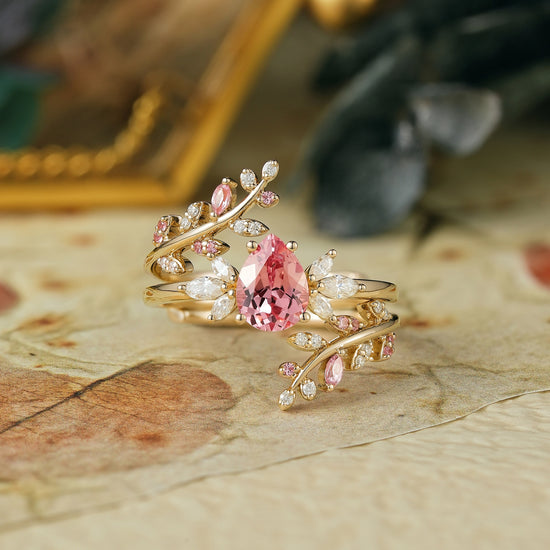 Padparadscha enhancer ring set with moissanite