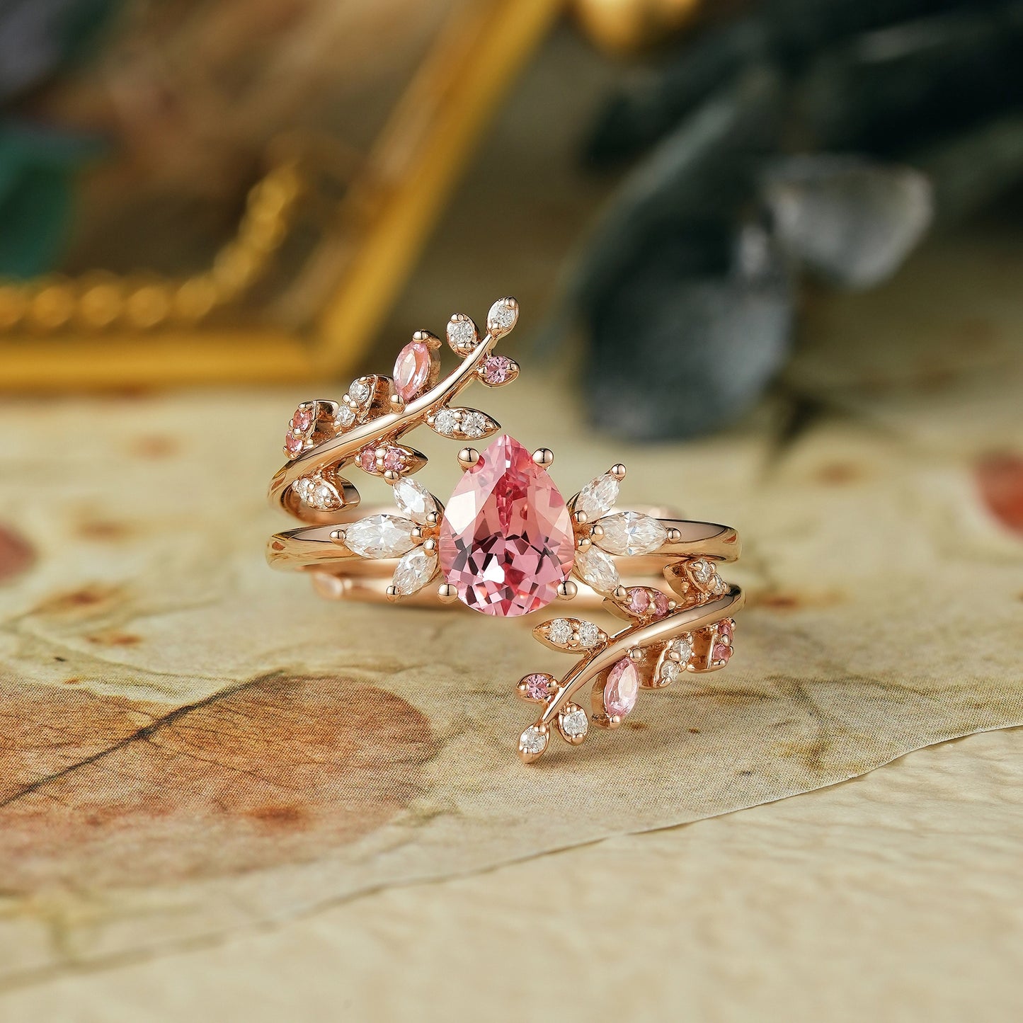 Padparadscha enhancer ring set with moissanite