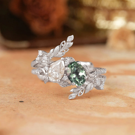 GemsMagic Two - Stone Pear Moissanite and Oval Green Sapphire Toi Et Moi Leaf Bridal Ring Set