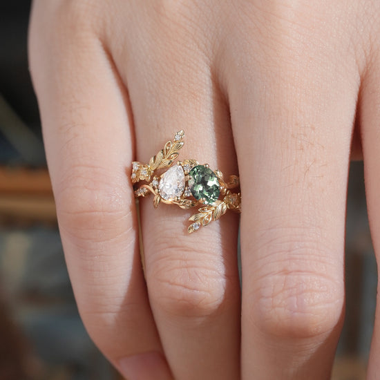 GemsMagic Two - Stone Pear Moissanite and Oval Green Sapphire Toi Et Moi Leaf Bridal Ring Set