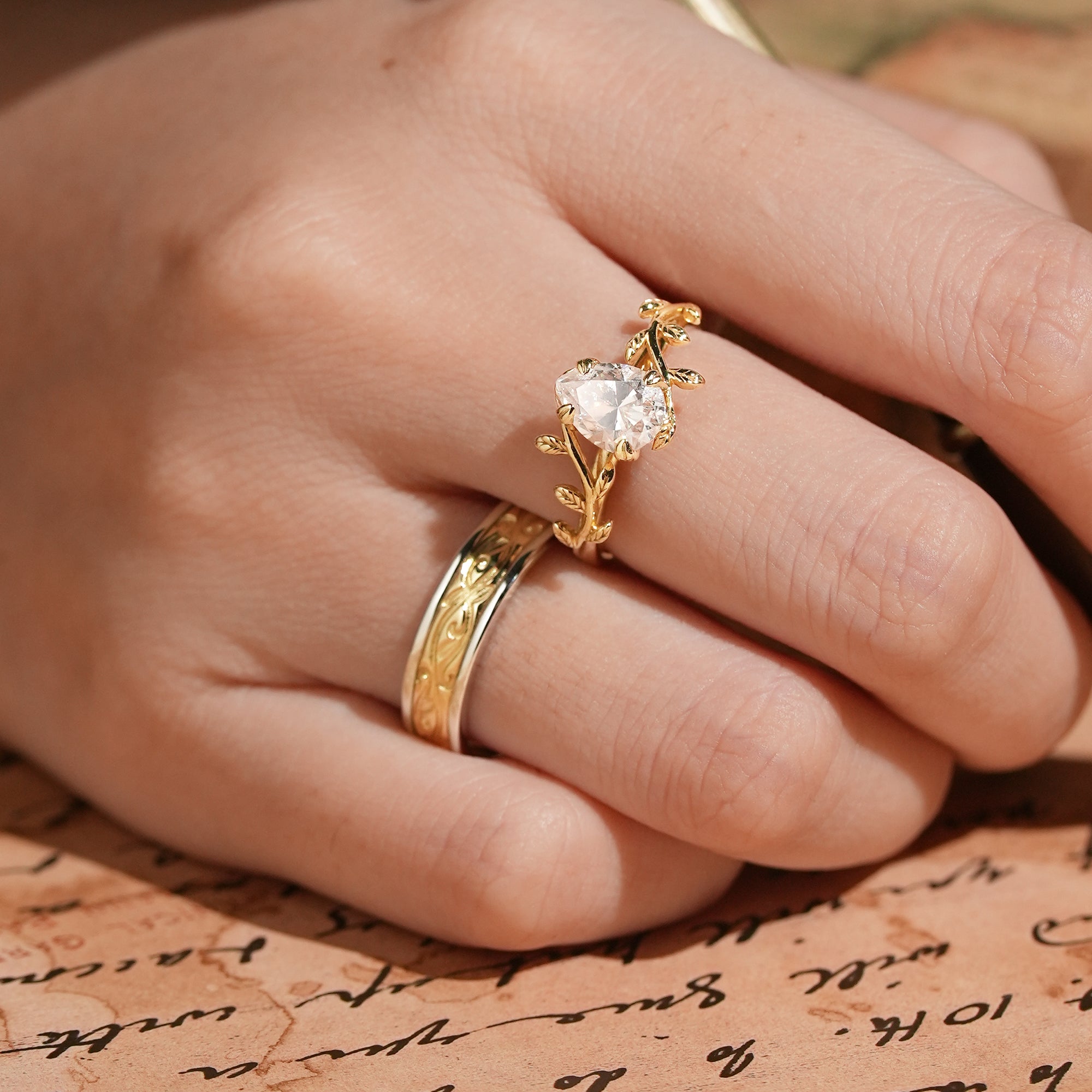 Pear Cut Moissanite Mixed Metal Leaf Inspired Couple Ring Set - Clementine & Moore