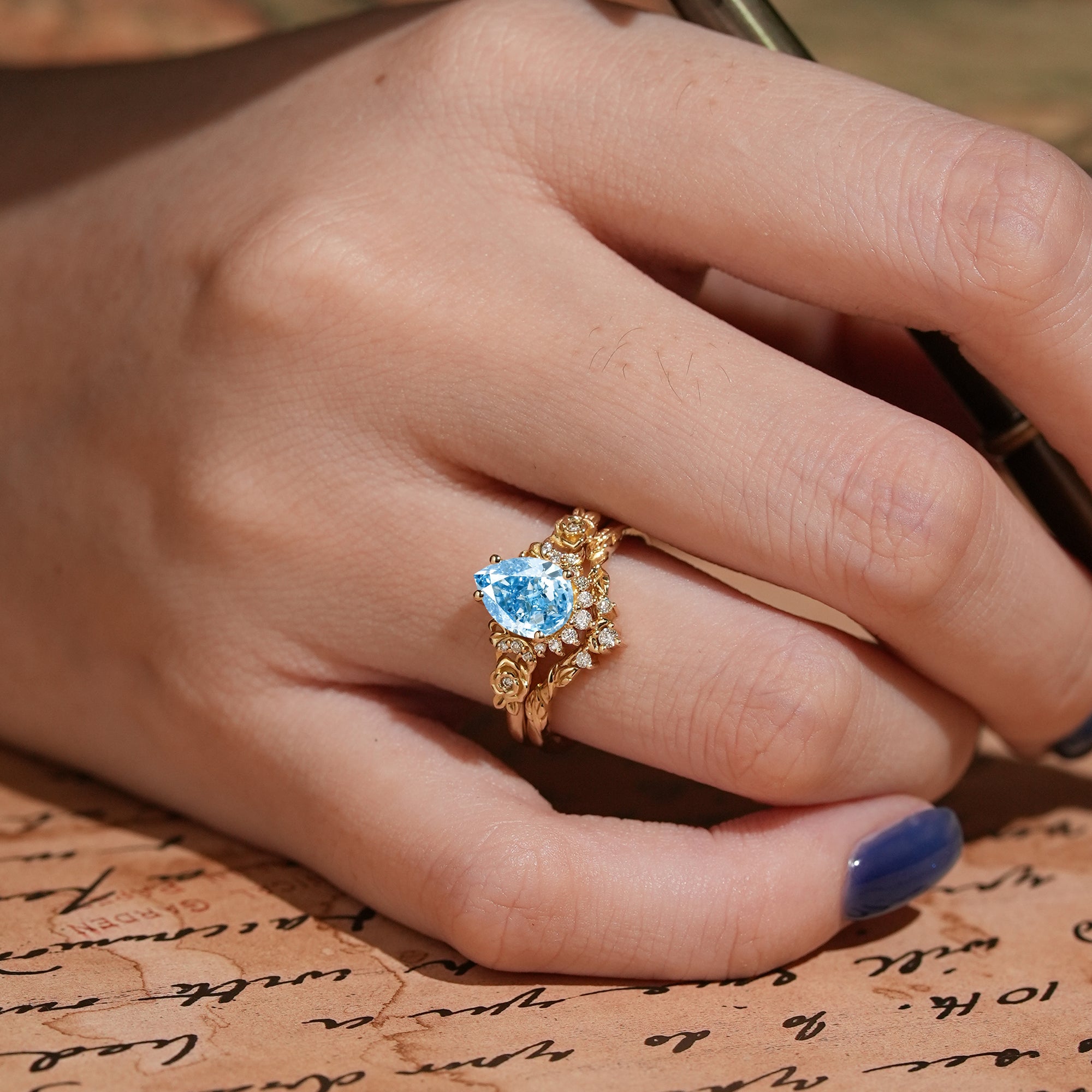 Pear Cut Lab Grown Blue Diamond Moon And Flower Inspired Bridal Ring Set