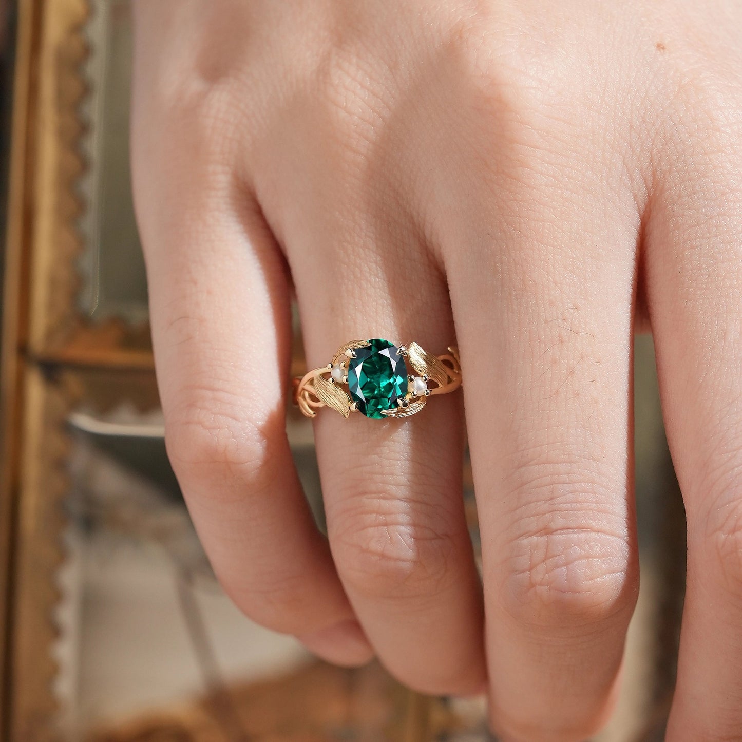 Elegant Oval Cut Emerald Brushed Gold Leaf Ring - Thea - GemsMagic