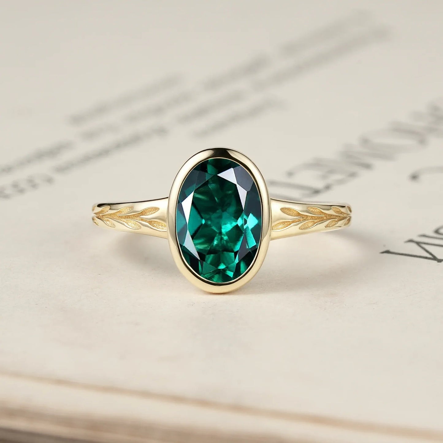 Golden Elegance: Oval Emerald Leaf Ring | Celia - GemsMagic