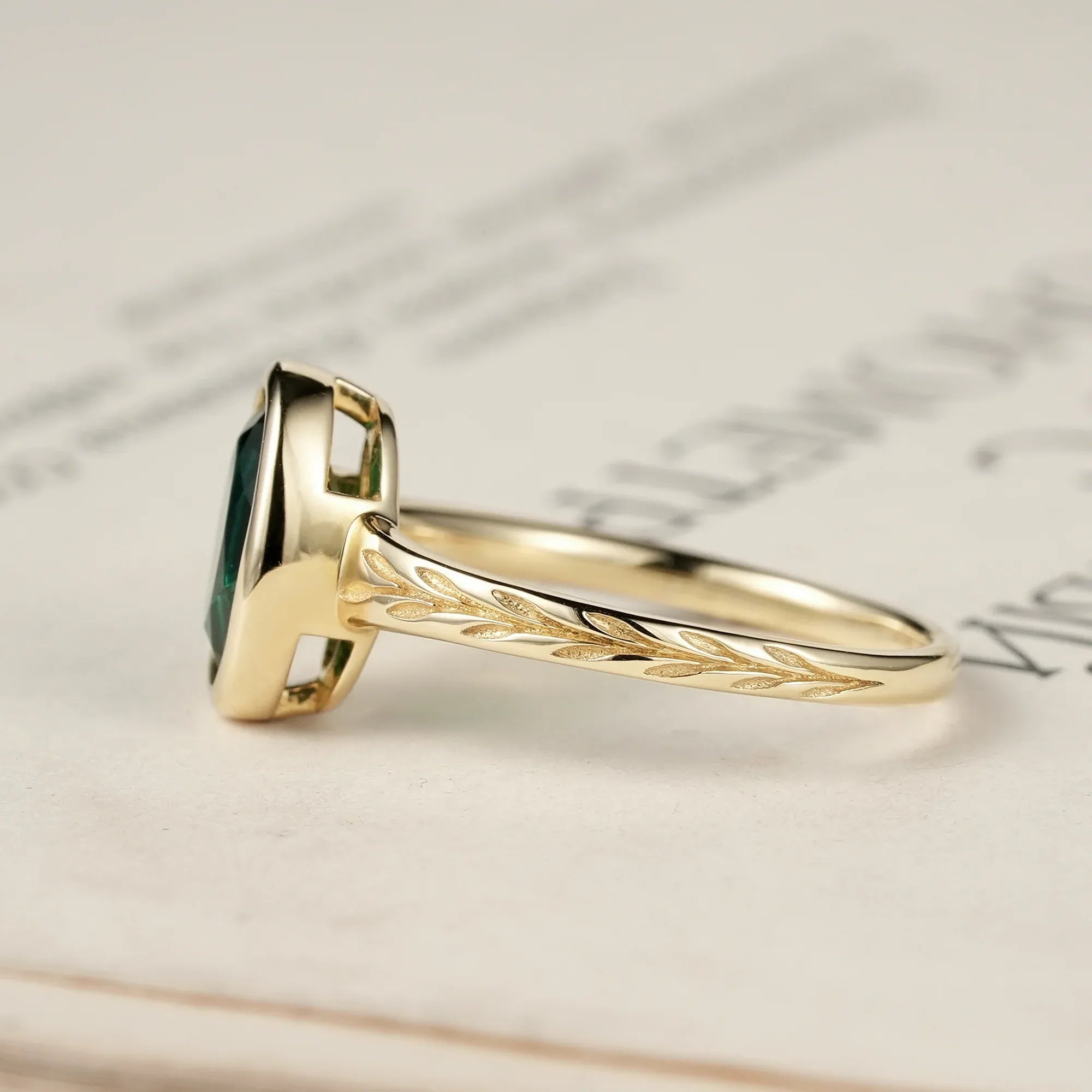 Golden Elegance: Oval Emerald Leaf Ring | Celia - GemsMagic