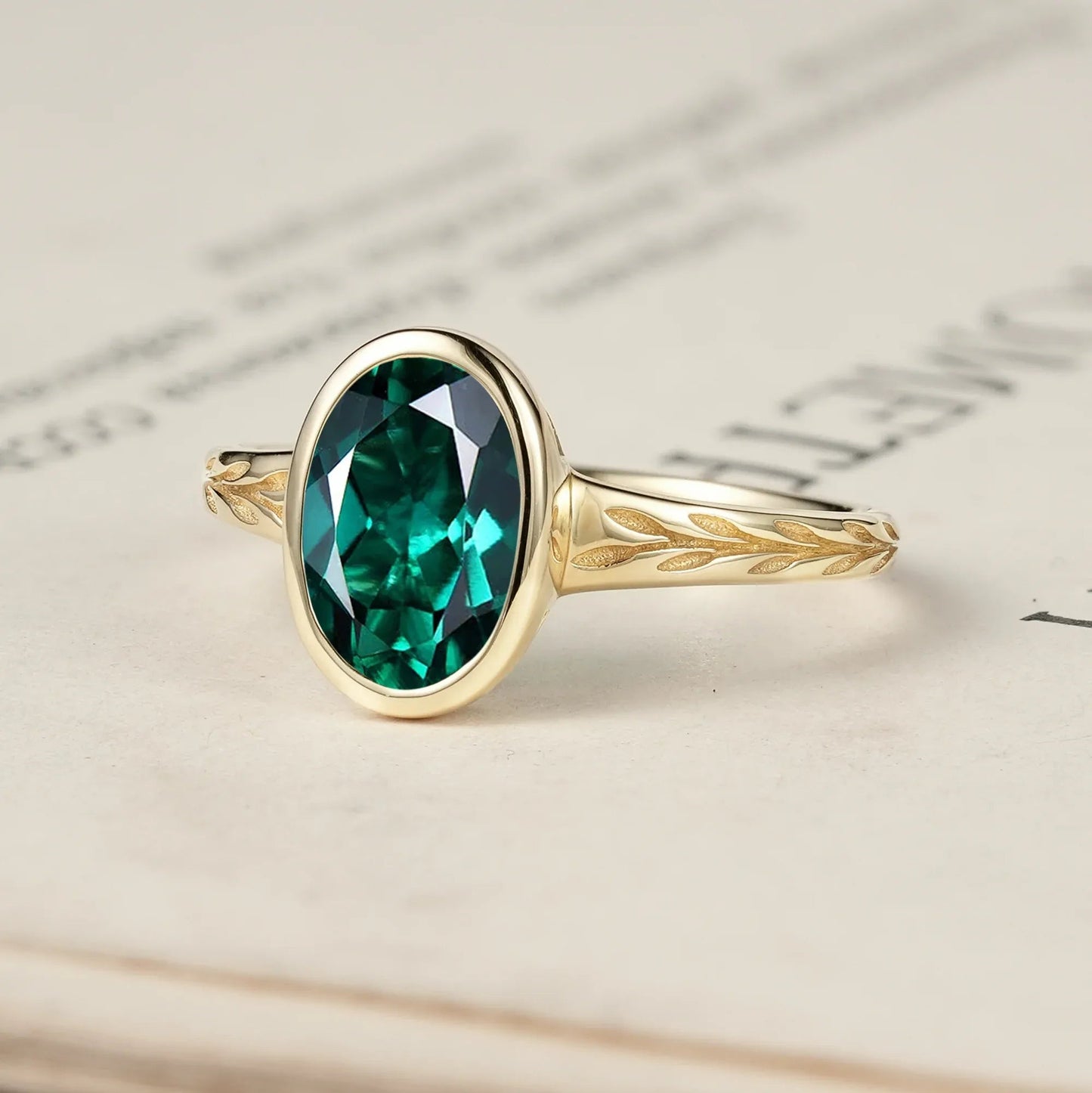 Golden Elegance: Oval Emerald Leaf Ring | Celia - GemsMagic