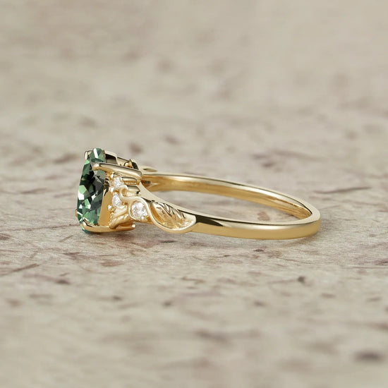 Nature's Embrace: Oval Cut Green Sapphire Leaf Ring - Lila - GemsMagic
