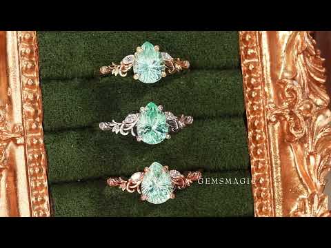 Load and play video in Gallery viewer, Olive Branch Inspired Sparkle Cut Green Sapphire Engagement Ring - Rene
