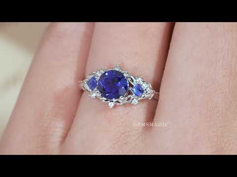 Load and play video in Gallery viewer, Three Stone Royal Blue Sapphire Engagement Ring - Estelle
