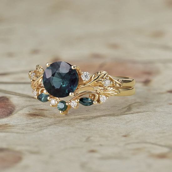 Teal Sapphire Ring with Elegant Leaf Motif
