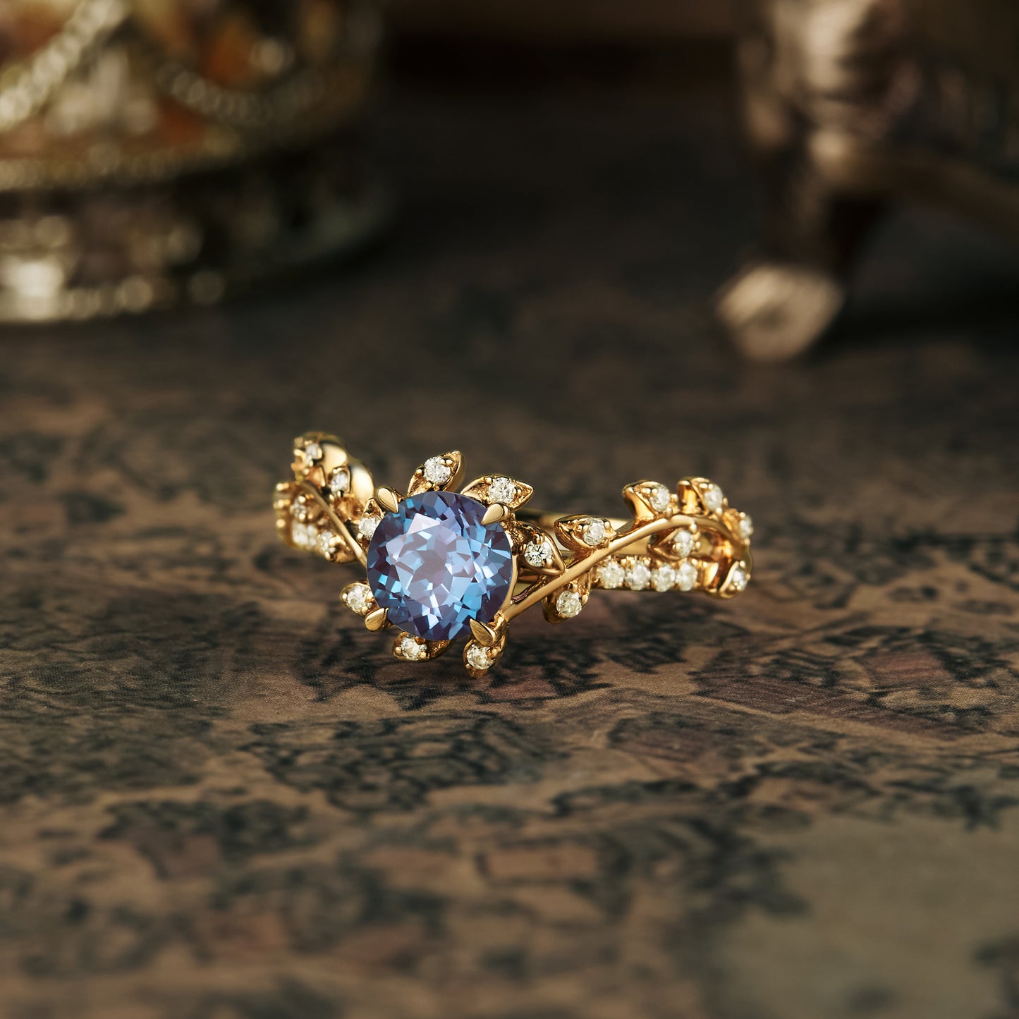Nature-inspired gold engagement ring with lab alexandrite and moissanite accents