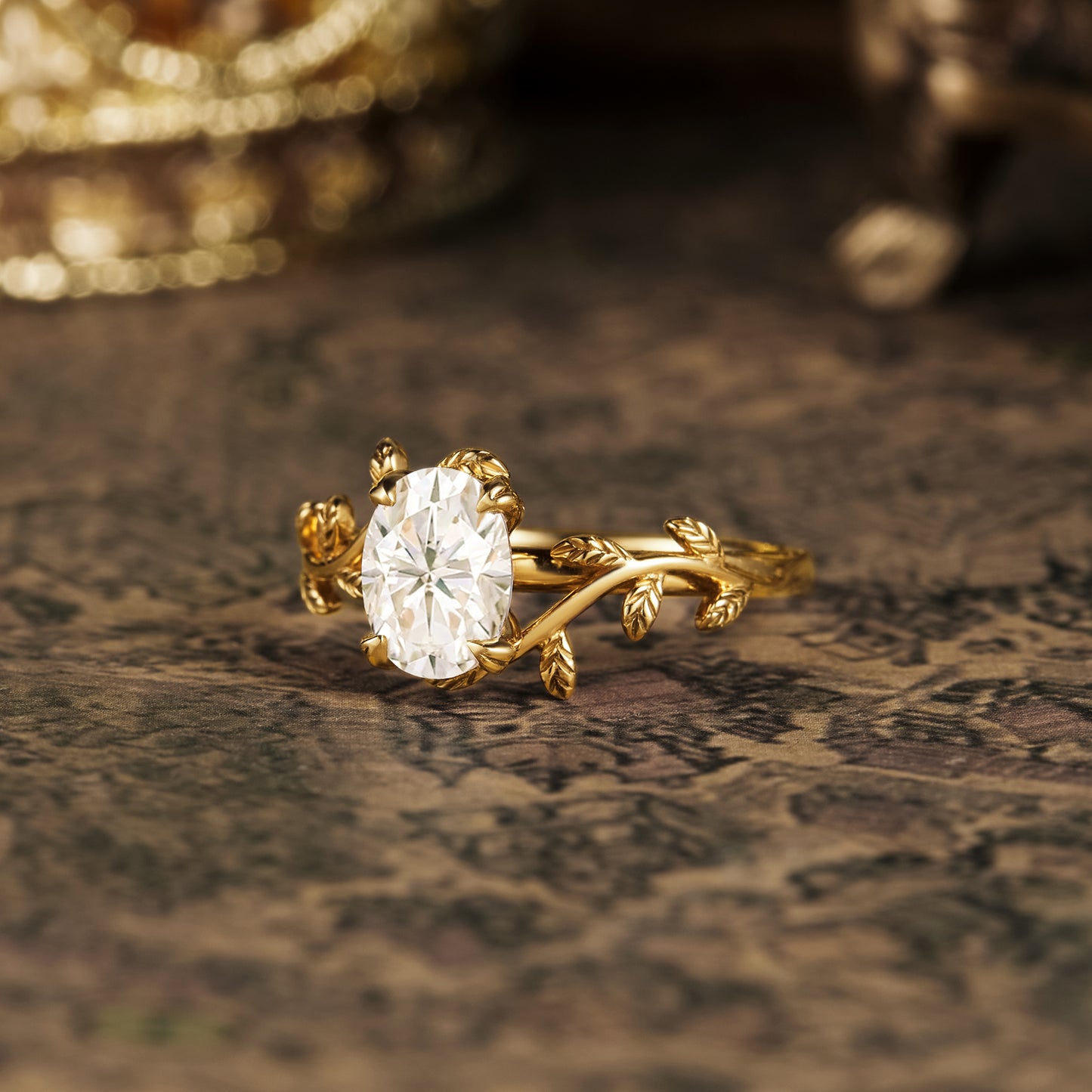 Nature-inspired gold engagement ring with oval moissanite and leaf accents