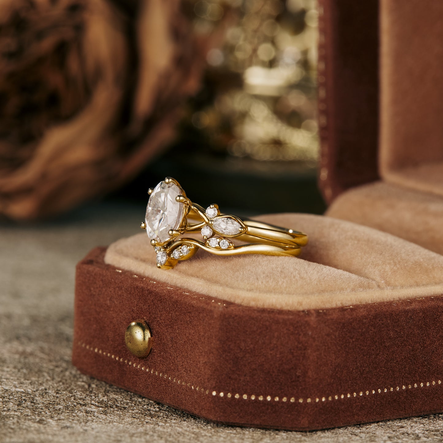 Honeysuckle inspired Moissanite ring set in luxurious velvet jewelry box.