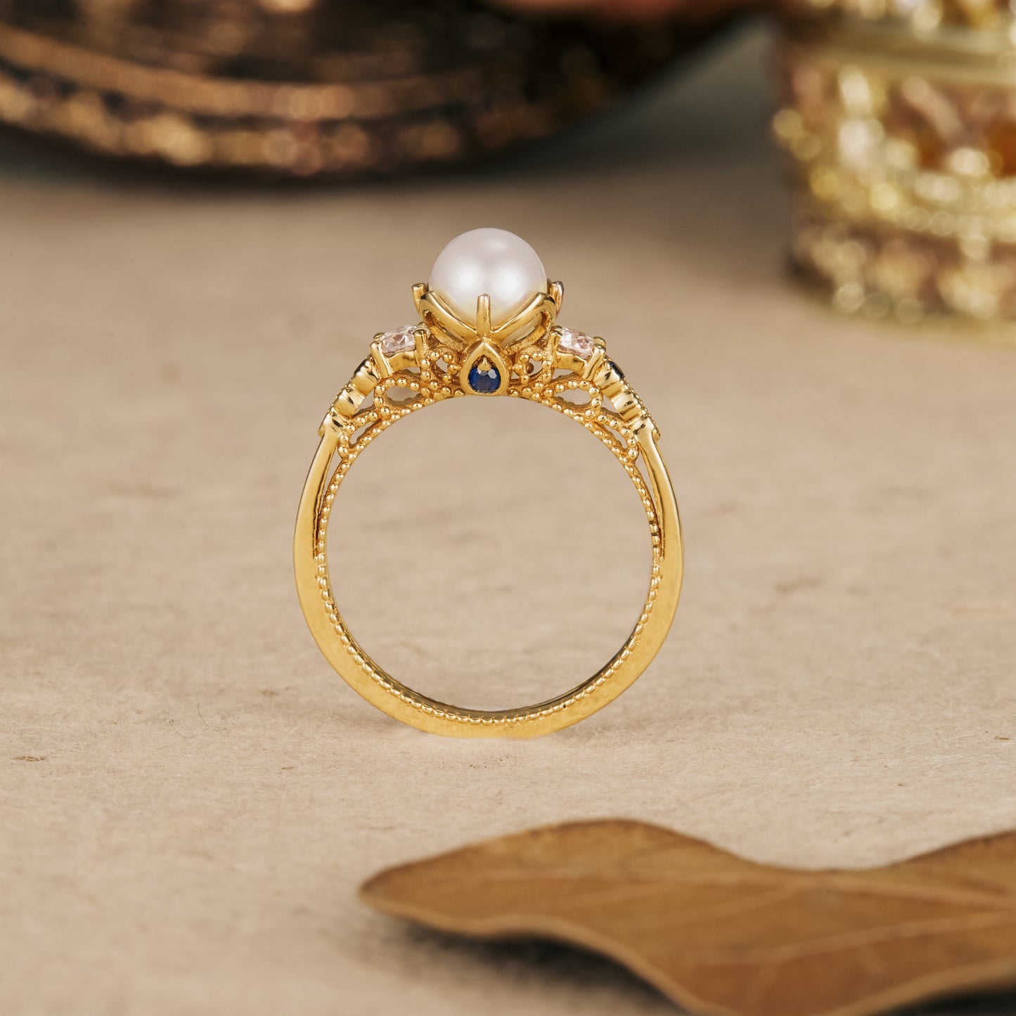Elegant Akoya pearl promise ring with moissanite and sapphire accents in gold setting