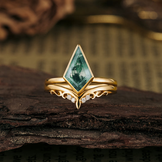 Kite-cut moss agate ring set with diamonds in gold band