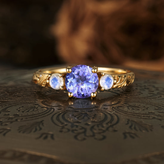 Tanzanite moonstone cluster engagement ring with gold leaf engraving