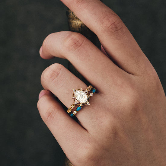 Model wearing boho moissanite engagement ring set with turquoise accents